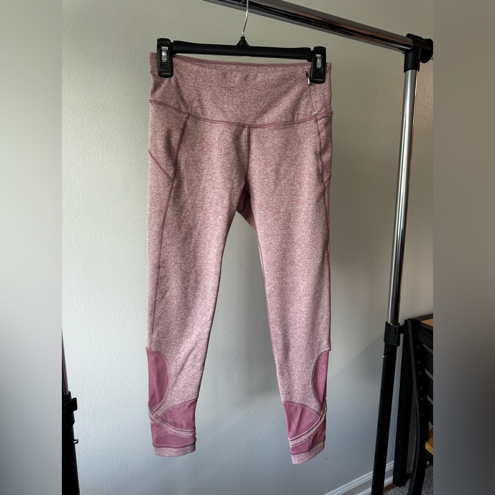 (Small) pink Calia leggings with a mesh cross pattern in the front
